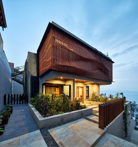 Nhà bọc gỗ lượn sóng độc đáo khiến ai cũng ngước nhìn - Ảnh 6. Nhà bọc gỗ lượn sóng độc đáo khiến ai cũng ngước nhìn - Ảnh 6.